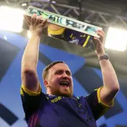 Luke 'The Nuke' Littler Demolishes Humphries in Stunning Grand Slam Darts Upset