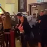 Machete-Wielding Attacker Hacks Man in Shocking Pub Ambush - Police Launch Manhunt