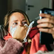 NHS Urges Public Not to Dismiss New COVID Symptoms as Just a Cold