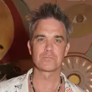 Robbie Williams Reveals Tourettes Diagnosis Following Years of Uncontrollable Tics