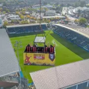 Salford City Fans Scale 50m Crane in Bizarre Stadium Protest - Football World Stunned