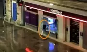 Shocking Footage: Bathroom Fitter Smashes Bank Windows During City Centre Riot