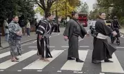 Sumo Wrestlers Recreate Iconic Beatles Abbey Road Crossing in Bizarre London Stunt