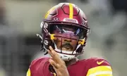 Washington Commanders Rookie Quarterback Jayden Daniels Sidelined with Hamstring Injury Ahead of Cowboys Clash
