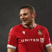 Wrexham Star Paul Mullin's Boots Deliver Stunning Political Message Against Conservative Government