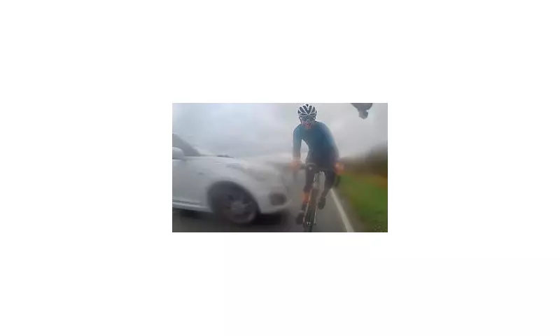 Cyclist's Miraculous Escape as Skidding Car Misses by Inches