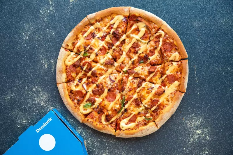 Domino's Profits Slump as Brits Reject Pricey Pizza Orders