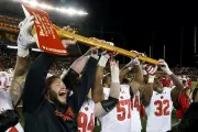 College Football's Quirky Rivalry Trophies: Axes, Pigs & Cannons