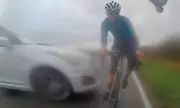 Cyclist's Miraculous Escape as Skidding Car Misses by Inches