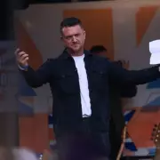 Epstein Emails Reveal Far-Right Ties: Tommy Robinson Support & Holocaust Jokes