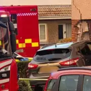 Grey Nissan Crashes into Fife Home as Police Seal Off Dalgety Bay Street