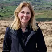 Injured Father Carries Wife's Coffin as Son Faces Murder Charge