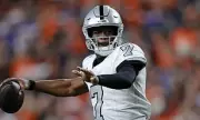 Raiders' Quarterback Crisis Deepens as Geno Smith Suffers Injury in Painful Broncos Defeat