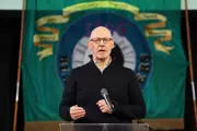 Swinney Condemns Asylum Seeker Hotel Protests as Racist