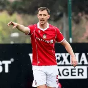 Wrexham AFC's Transfer Coup: Ryan Reynolds & Rob McElhenney Secure Championship Defender