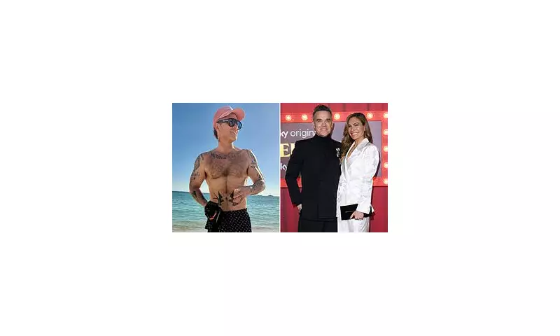 Robbie Williams' Shirtless Beach Snap Reveals 2 Stone Weight Loss Journey