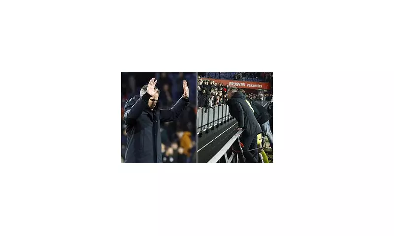 Robin van Persie leaps over hoardings to confront fans after Feyenoord's 8th loss