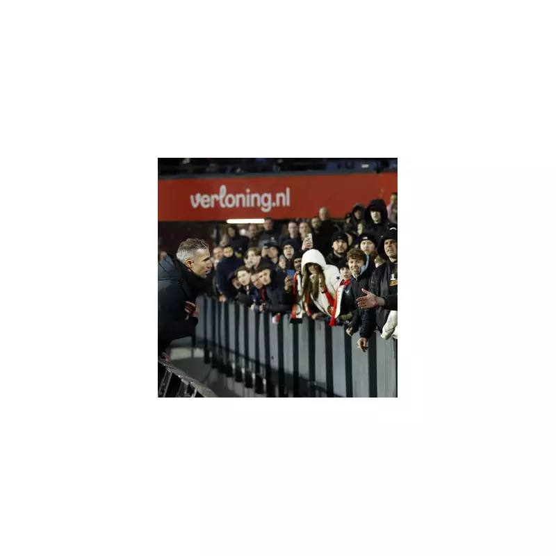 Van Persie leaps over boards to confront furious fans after Feyenoord's 8th loss