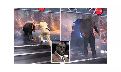 Shaquille O'Neal Smashes Through Studio Wall in Christmas Day NBA Broadcast Stunt