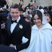 Adam Peaty's Family Signal Distress with Upside-Down Flag on Wedding Day