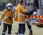 Bushfire Threatens Homes Near Perth as Storms Lash Queensland