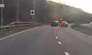 Dashcam Horror: Driver's Near-Death Miss After Central Reservation Crash