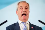 Farage urged to sack Reform candidate over 'go home' posts about Lammy