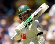 Khawaja's 82 and Carey's century rescue Australia after Smith's late withdrawal