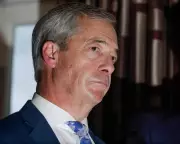 Nigel Farage urged to apologise for school racism claims by ex-EHRC head