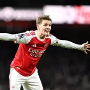 Odegaard Inspires Arsenal to Premier League Summit with 2-1 Win Over Brighton