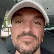 Peter Andre's teeth chipped by drunk fan's mic kick on stage