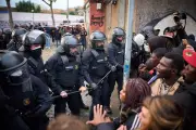 Riot Police Evict Hundreds of Migrants from Abandoned Spanish School