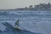 Surfers Return to Gaza Coastline Amidst Visible War Damage