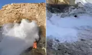 Tourist Cheats Death After Wave Smashes Her Into Rocks in Egypt Photo Mishap