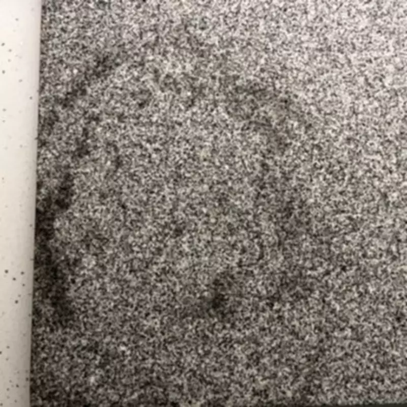 59p Baking Soda Hack Fails to Remove Oil Stain from Granite Chopping Board