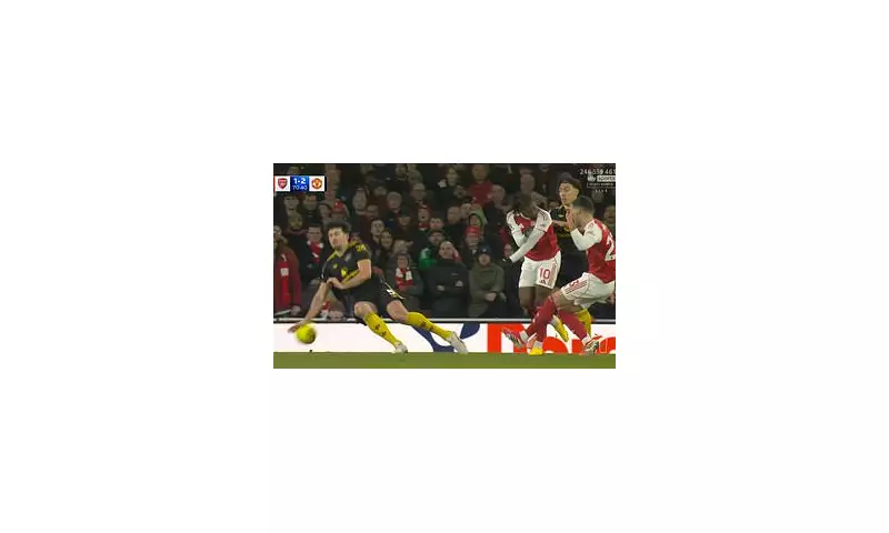 Arsenal Fans Furious as VAR Clears Maguire Handball Incident in Dramatic 3-2 Defeat