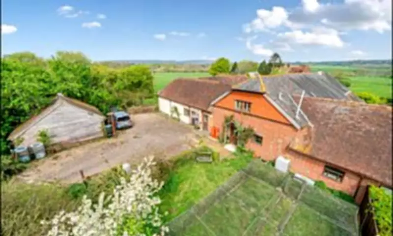 Barn Conversion with a Grave in the Garden Sells After Price Cut