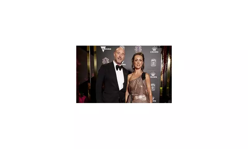 Carlton President's Wife Files Defamation Suit Over Lewd Photo Scandal