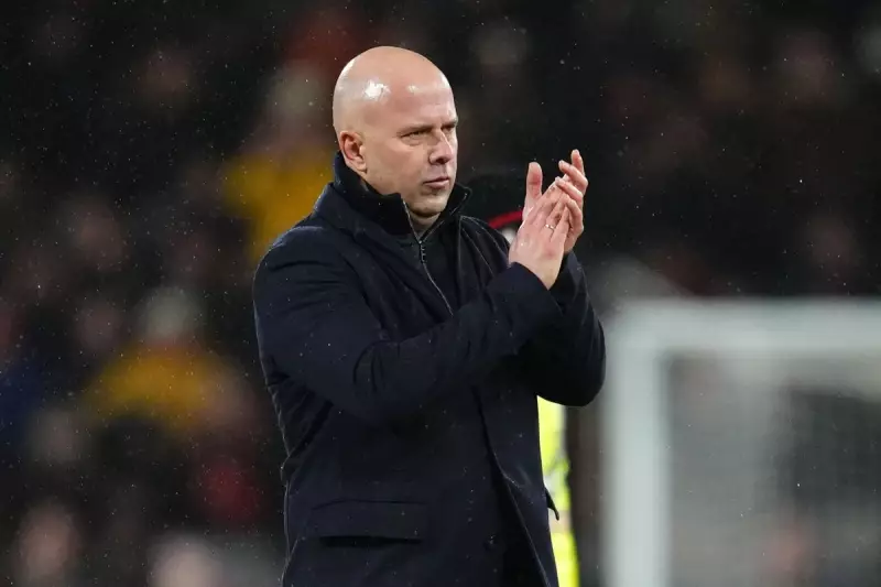 Carragher Warns: Slot's Liverpool Future Hinges on Champions League Qualification