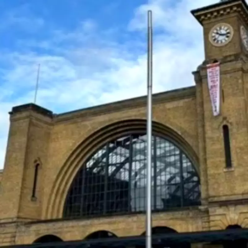 Chaos at King's Cross as Protester Scales Station Building, Police Swarm