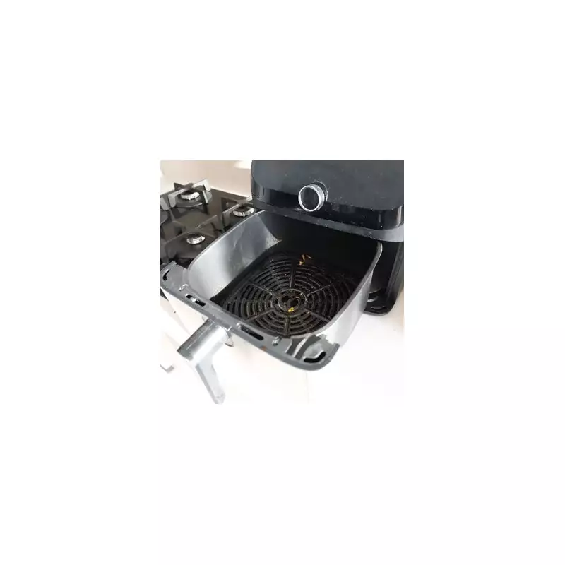 Clean Your Air Fryer Like New With 3 Kitchen Staples, No Scrubbing