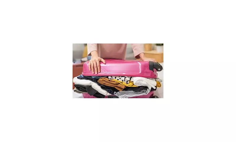 Expert Packer Reveals How to Fit Two Weeks of Clothes in Carry-On Luggage