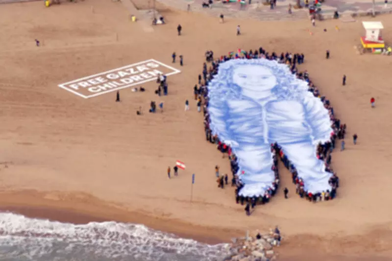 Giant Beach Portrait of Gaza Girl Hind Rajab Unveiled in Barcelona Protest