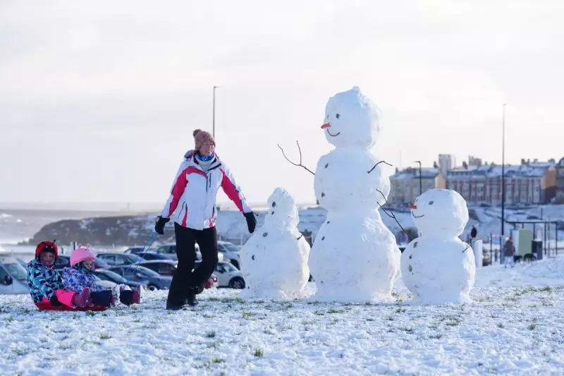 Heavy Snowfall Transforms North Yorkshire Coast: Sledging and Snowmen Galore