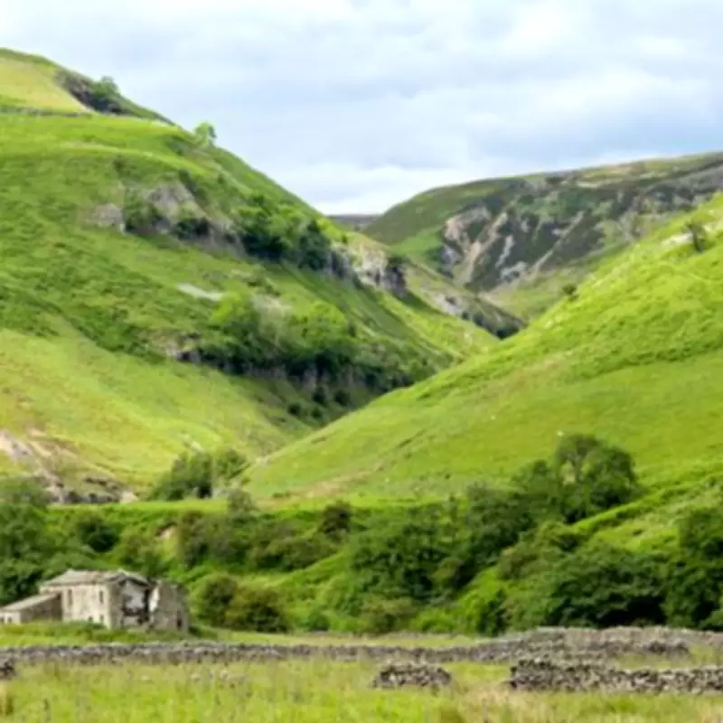 Hull Pot: Yorkshire's Majestic Natural Hole with Castle Walls and Waterfall