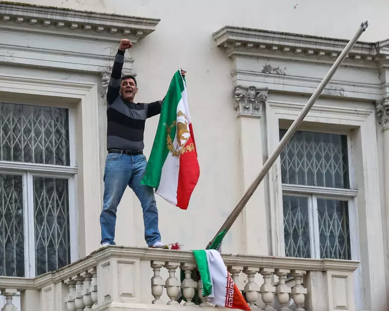 Iranian Protester Removes Flag from London Embassy in Anti-Regime Demonstration
