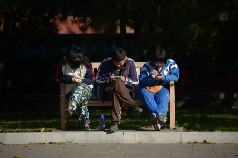 Morbid 'Are You Dead?' App Tops Charts, Highlighting China's Loneliness Crisis