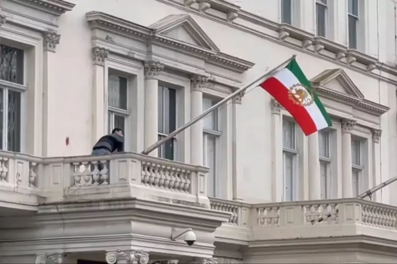 Protester Scales Iranian Embassy in London, Replaces Flag in Dramatic Act