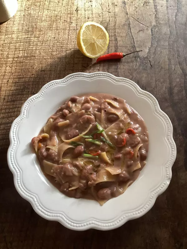 Rachel Roddy's Pasta e Fagioli with Coconut, Spring Onion, Chilli, and Lemon