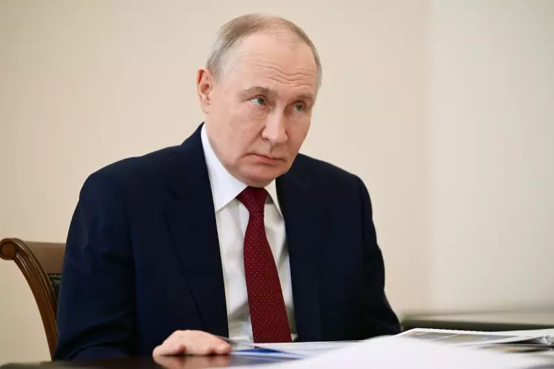 Trump Displays Putin Photo in White House Above Grandchild Picture